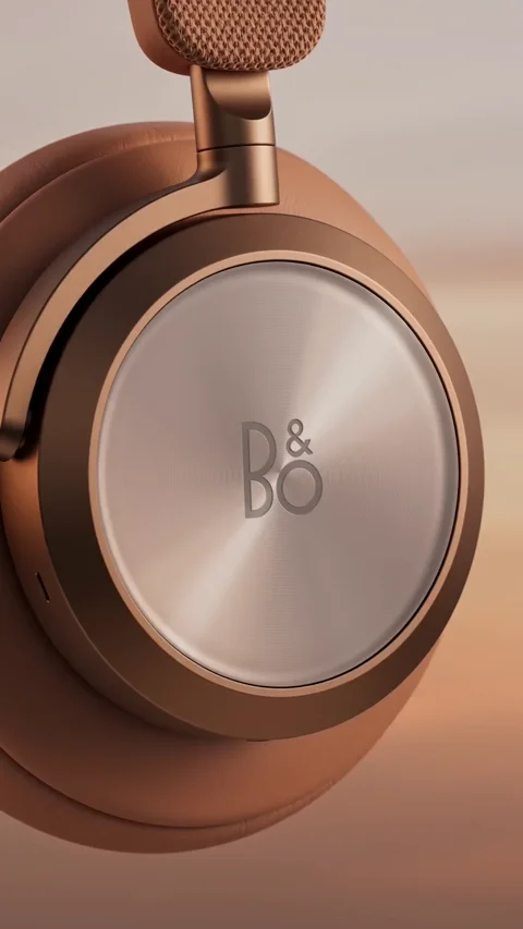Close-up of bronze over-ear headphones